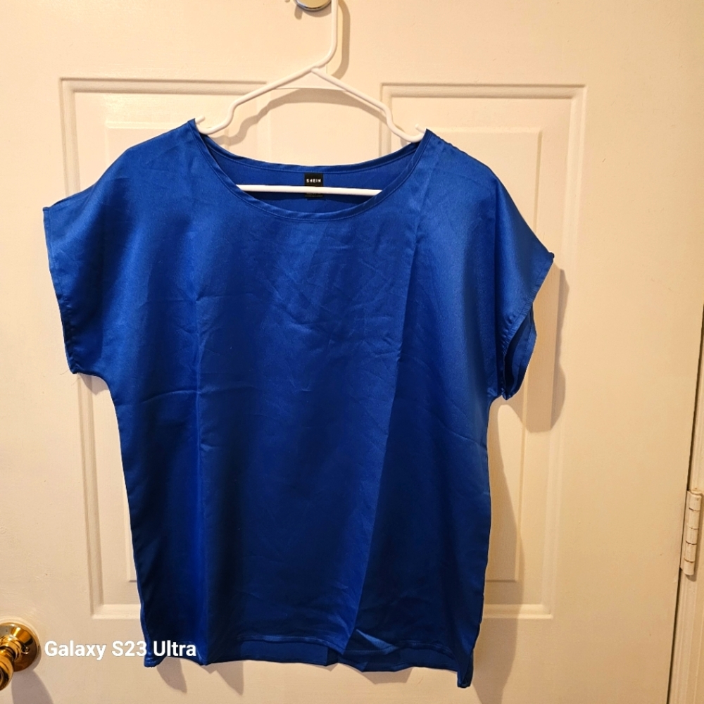 Womens satin blue top new without tags